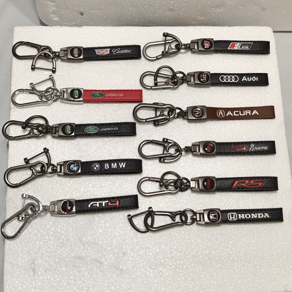 Leather car keychains with brand logos. $12 Each One.